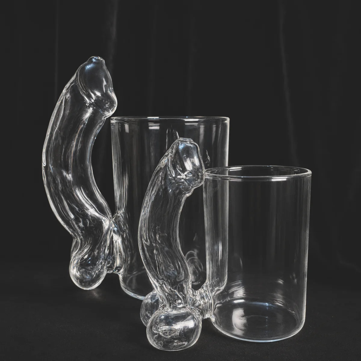 Mini and Original handmade glass mugs with hollow sculpted handles